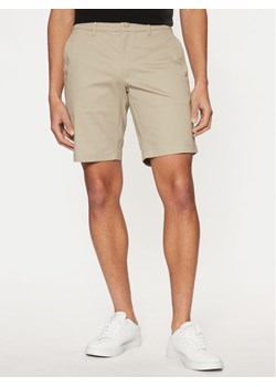 Calvin Klein Szorty materiałowe K10K114071 Beżowy Slim Fit ze sklepu MODIVO w kategorii Spodenki męskie - zdjęcie 183652460