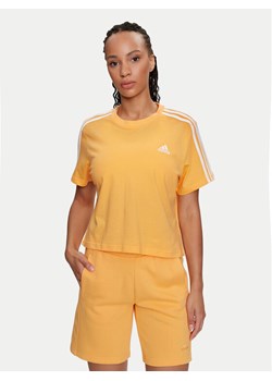adidas T-Shirt Essentials 3-Stripes IS1575 Żółty Loose Fit ze sklepu MODIVO w kategorii Bluzki damskie - zdjęcie 183660272