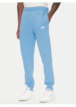 Nike Spodnie dresowe BV2671 Niebieski Regular Fit ze sklepu MODIVO w kategorii Spodnie męskie - zdjęcie 183678791