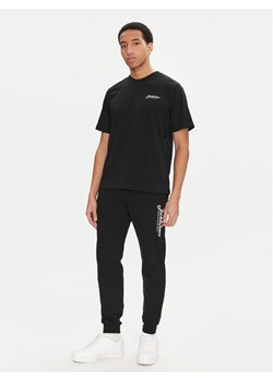Jack & Jones Komplet t-shirt i spodnie dresowe Beau 12277849 Czarny Relaxed Fit ze sklepu MODIVO w kategorii Spodnie męskie - zdjęcie 183678960
