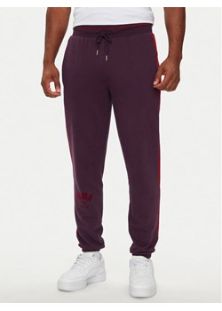 Puma Spodnie dresowe T7 PLAY.PARIS 626768 44 Bordowy Regular Fit ze sklepu MODIVO w kategorii Spodnie męskie - zdjęcie 183737172