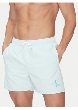 Calvin Klein Swimwear Szorty kąpielowe KM0KM01101 Zielony Regular Fit ze sklepu MODIVO w kategorii Kąpielówki - zdjęcie 183737281