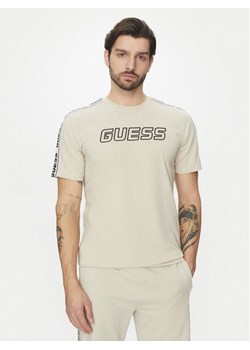 Guess T-Shirt Z4GI18 J1314 Beżowy Regular Fit ze sklepu MODIVO w kategorii T-shirty męskie - zdjęcie 183778742