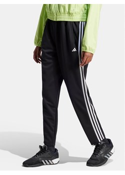 adidas Spodnie dresowe Train Essentials HZ5646 Czarny Loose Fit ze sklepu MODIVO w kategorii Spodnie damskie - zdjęcie 183813131