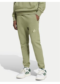adidas Spodnie dresowe ALL SZN French Terry IY6557 Zielony Regular Fit ze sklepu MODIVO w kategorii Spodnie męskie - zdjęcie 183813944