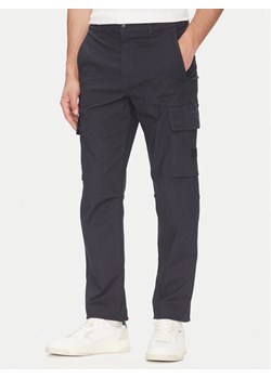 BOSS Spodnie materiałowe 50536882 Granatowy Regular Fit ze sklepu MODIVO w kategorii Spodnie męskie - zdjęcie 183815034
