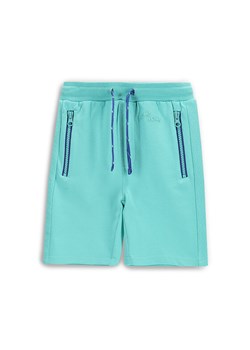Coccodrillo Szorty sportowe WC5120502IBK Turkusowy Regular Fit ze sklepu MODIVO w kategorii Spodenki chłopięce - zdjęcie 183815094