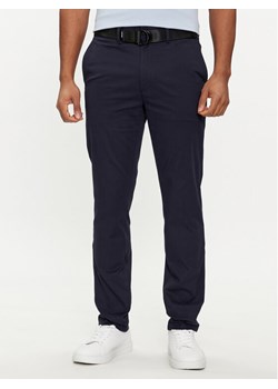 Calvin Klein Chinosy Modern K10K110979 Granatowy Slim Fit ze sklepu MODIVO w kategorii Spodnie męskie - zdjęcie 183862664