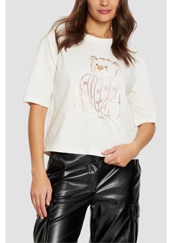 GUESS Beżowy  t-shirt damski Bear Boxy, Rozmiar XS ze sklepu outfit.pl w kategorii Bluzki damskie - zdjęcie 183872420