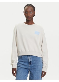 Tommy Jeans Bluza DW0DW21345 Beżowy Relaxed Fit ze sklepu MODIVO w kategorii Bluzy damskie - zdjęcie 183885431