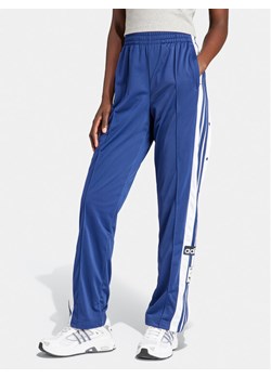 adidas Spodnie dresowe Adibreak IP0619 Granatowy Regular Fit ze sklepu MODIVO w kategorii Spodnie damskie - zdjęcie 183885670