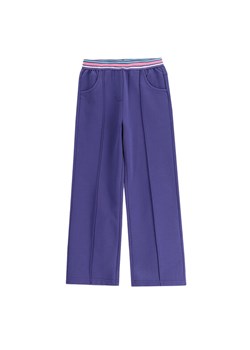 Coccodrillo Spodnie dresowe WC5120101CGK Granatowy Slim Fit ze sklepu MODIVO w kategorii Spodnie dziewczęce - zdjęcie 183907554