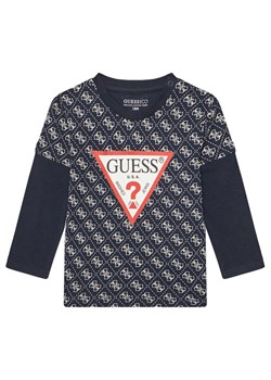 Guess Bluzka N5YI09 K8HM4 Granatowy Regular Fit ze sklepu MODIVO w kategorii Kaftaniki i bluzki - zdjęcie 183910671
