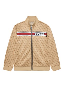 Guess Bluza L4YQ24 FL04Q Beżowy Regular Fit ze sklepu MODIVO w kategorii Bluzy chłopięce - zdjęcie 183921712