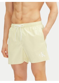 Calvin Klein Swimwear Szorty kąpielowe KM0KM01101 Żółty Regular Fit ze sklepu MODIVO w kategorii Kąpielówki - zdjęcie 183937880