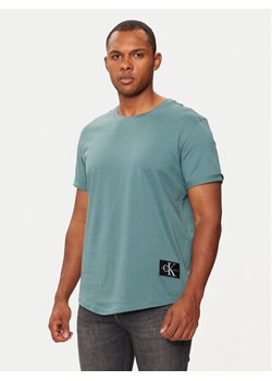 Calvin Klein Jeans T-Shirt J30J323482 Niebieski Regular Fit ze sklepu MODIVO w kategorii T-shirty męskie - zdjęcie 183938172