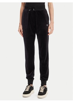 Guess Spodnie dresowe V3BB27 K0232 Czarny Regular Fit ze sklepu MODIVO w kategorii Spodnie damskie - zdjęcie 183941543
