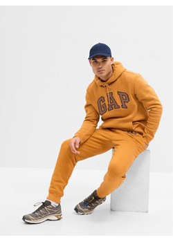 Gap Spodnie dresowe 753733-00 Brązowy Regular Fit ze sklepu MODIVO w kategorii Spodnie męskie - zdjęcie 183944754