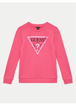 Guess Bluza J74Q10 KAUG0 Różowy Regular Fit ze sklepu MODIVO w kategorii Bluzy dziewczęce - zdjęcie 183946584