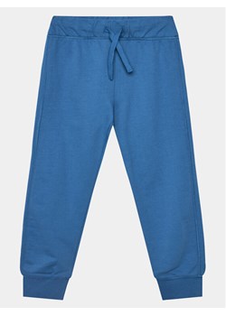 United Colors Of Benetton Spodnie dresowe 3BC1CF04P Niebieski Regular Fit ze sklepu MODIVO w kategorii Spodnie chłopięce - zdjęcie 183946874