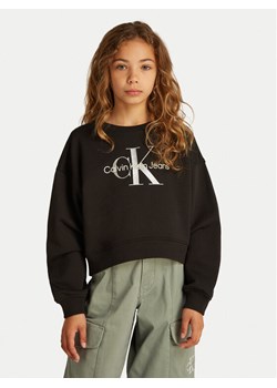Calvin Klein Jeans Bluza Glitter Monologo IG0IG02823 D Czarny Boxy Fit ze sklepu MODIVO w kategorii Bluzy dziewczęce - zdjęcie 183946990