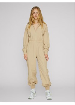 ROTATE Kombinezon Cliera RT494 Beżowy Slim Fit ze sklepu MODIVO w kategorii Kombinezony damskie - zdjęcie 183948223