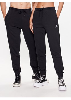 Converse Spodnie dresowe Unisex 10023873-A01 Czarny Standard Fit ze sklepu MODIVO w kategorii Spodnie męskie - zdjęcie 183948410