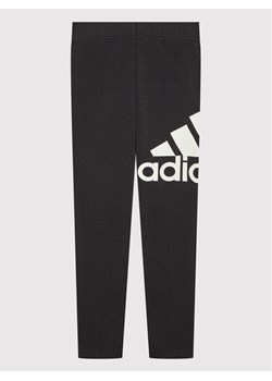 adidas Legginsy Essentials Tights GN4081 Czarny Slim Fit ze sklepu MODIVO w kategorii Spodnie dziewczęce - zdjęcie 183948623