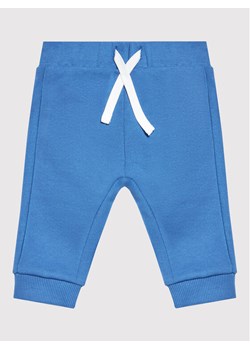 United Colors Of Benetton Spodnie dresowe 3J70I0041 Niebieski Regular Fit - id: 0000300236079 - marki United Colors Of Benetton - 183948751 United Colors Of Benetton Spodnie dresowe 3J70I0041 Niebieski Regular Fit ze sklepu MODIVO w kategorii Odzież dla niemowląt - zdjęcie 183948751