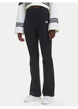 adidas Legginsy Essentials Small Logo JD9961 Czarny Flared Fit ze sklepu MODIVO w kategorii Spodnie damskie - zdjęcie 184009960