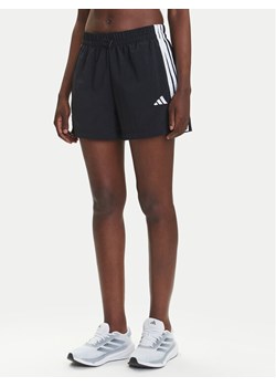 adidas Szorty sportowe Essentials 3-Stripes JE1309 Czarny Loose Fit ze sklepu MODIVO w kategorii Szorty - zdjęcie 184019363