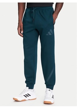 adidas Spodnie dresowe Z.N.E. JW4724 Zielony Loose Fit ze sklepu MODIVO w kategorii Spodnie męskie - zdjęcie 184026692