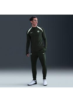 Męskie dresowe spodnie piłkarskie z dzianiny Nike Dri-FIT Chelsea F.C. Strike - Zieleń ze sklepu Nike poland w kategorii Spodnie męskie - zdjęcie 184044180