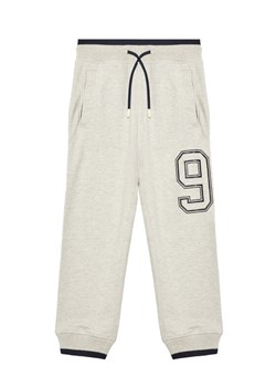 United Colors Of Benetton Spodnie dresowe 3BC1CF065 Szary Relaxed Fit ze sklepu MODIVO w kategorii Spodnie chłopięce - zdjęcie 184045593