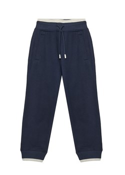 United Colors Of Benetton Spodnie dresowe 3BC1CF065 Granatowy Relaxed Fit ze sklepu MODIVO w kategorii Spodnie chłopięce - zdjęcie 184045743