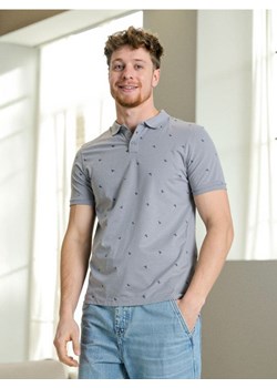 Sinsay - Koszulka polo z nadrukiem all over - niebieski ze sklepu Sinsay w kategorii T-shirty męskie - zdjęcie 184054491