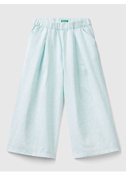 Benetton Lniane spodnie w kolorze błękitnym ze sklepu Limango Polska w kategorii Spodnie dziewczęce - zdjęcie 184098061