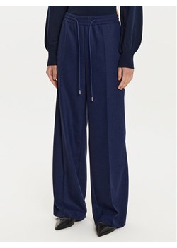 BOSS Spodnie dresowe Tavite1 50528604 Granatowy Relaxed Fit ze sklepu MODIVO w kategorii Spodnie damskie - zdjęcie 184098253