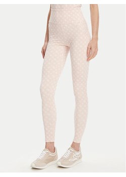 Guess Legginsy V5YB18 MC03W Różowy Slim Fit ze sklepu MODIVO w kategorii Spodnie damskie - zdjęcie 184103463