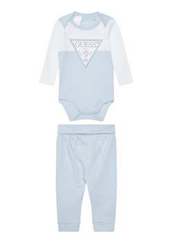 Guess Komplet body i spodnie H5YW08 J1314 Niebieski Regular Fit ze sklepu MODIVO w kategorii Odzież dla niemowląt - zdjęcie 184193103