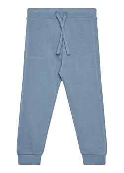 United Colors Of Benetton Spodnie dresowe 3J68CF01P Niebieski Regular Fit ze sklepu MODIVO w kategorii Spodnie chłopięce - zdjęcie 184197043