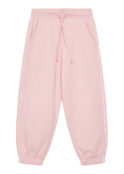 United Colors Of Benetton Spodnie dresowe 3UNICF060 Różowy Relaxed Fit ze sklepu MODIVO w kategorii Spodnie dziewczęce - zdjęcie 184197092