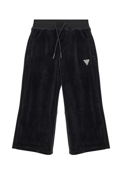 Guess Spodnie dresowe J4RQ16 K0232 Czarny Regular Fit ze sklepu MODIVO w kategorii Spodnie chłopięce - zdjęcie 184199603