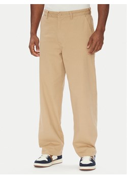 DC Chinosy Worker Baggy ADYNP03097 Beżowy Baggy Fit ze sklepu MODIVO w kategorii Spodnie męskie - zdjęcie 184199630