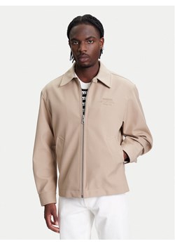 Tommy Hilfiger Kurtka przejściowa F1 Movie Mechanics MW0MW41370 Beżowy Regular Fit ze sklepu MODIVO w kategorii Kurtki męskie - zdjęcie 184235074