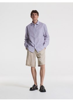 Reserved - Szorty slim fit z zakładkami - beżowy ze sklepu Reserved w kategorii Spodenki męskie - zdjęcie 184249422
