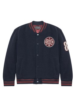 Guess Kurtka bomber L5YL06 WHE70 Granatowy Regular Fit ze sklepu MODIVO w kategorii Kurtki chłopięce - zdjęcie 184253284