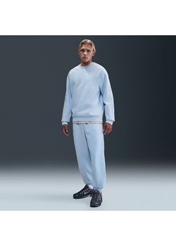 Męskie spodnie z dzianiny ze ściągaczami Nike Solo Swoosh - Niebieski - id: 41646248871new - marki Nike - 184264272 Męskie spodnie z dzianiny ze ściągaczami Nike Solo Swoosh - Niebieski ze sklepu Nike poland w kategorii Spodnie męskie - zdjęcie 184264272