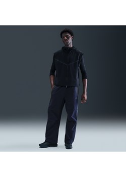 Męskie spodnie oversize z tkaniny Nike Tech - Niebieski ze sklepu Nike poland w kategorii Spodnie męskie - zdjęcie 184264541
