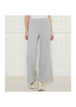 EA7 Spodnie dresowe | flare fit ze sklepu Gomez Fashion Store w kategorii Spodnie damskie - zdjęcie 184504633